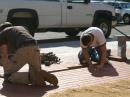 The masons take out the uninscribed bricks, making way for the new, personalized bricks. [S. Khrystyne Keane, K1SFA, Photo] 